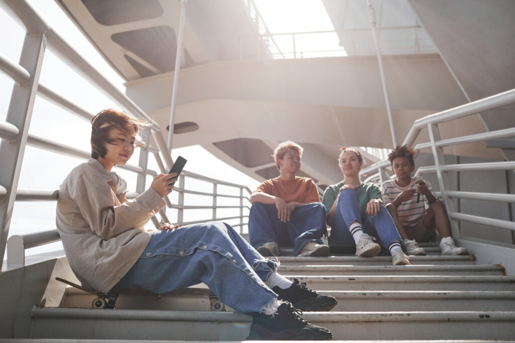 teens hanging out on stairs